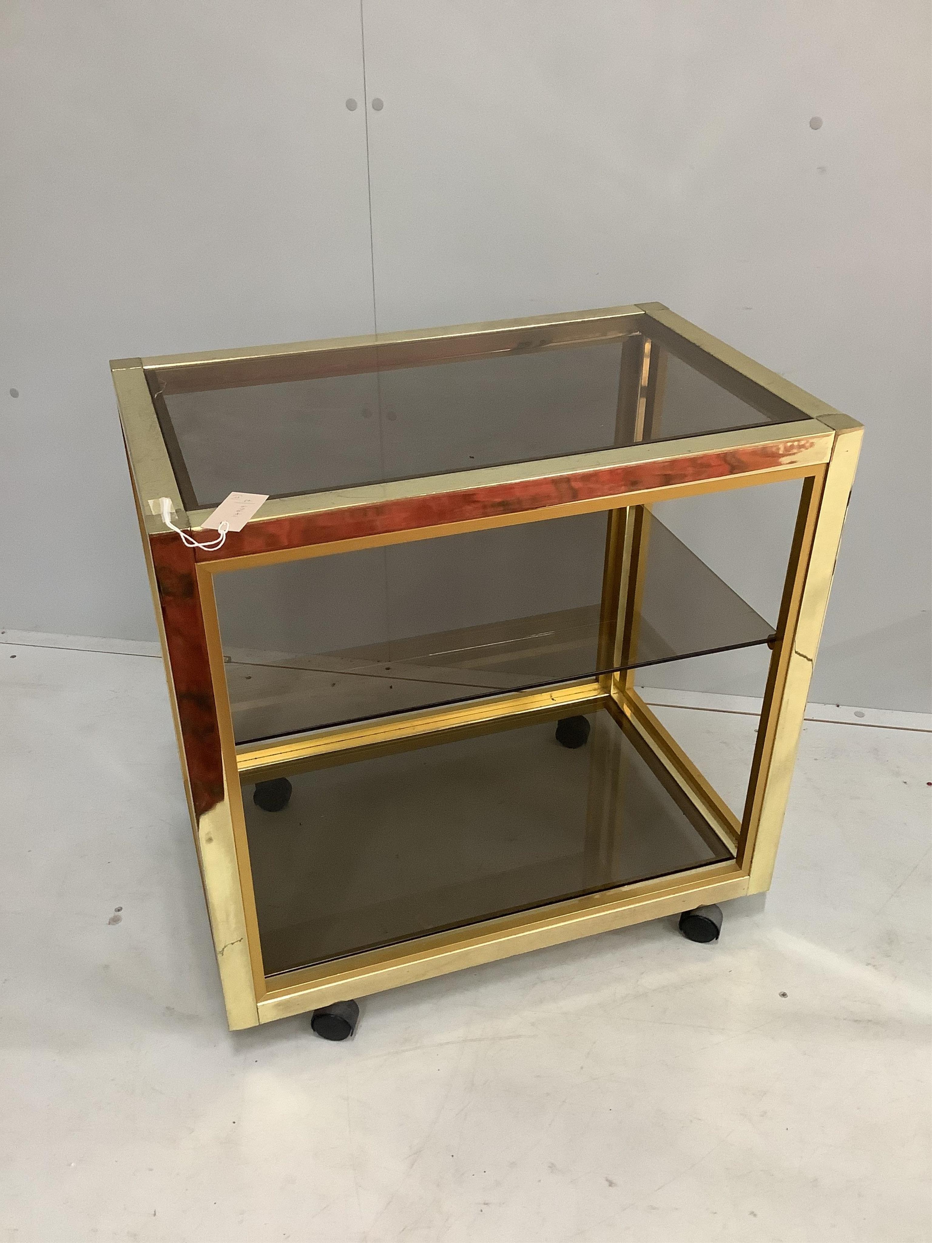 A mid century rectangular brass and clear glass top occasional table and matching tea trolley, largest width 70cm, depth 45cm, height 69cm. Condition - fair